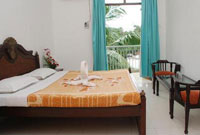 Jessica Saffron Beach Resort Bed Room