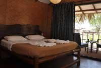 Montego Bay Beach Village Resort,Montego Bay Beach Village - luxury tents,log cabins,restaurant,beach house,Morjim,goa.